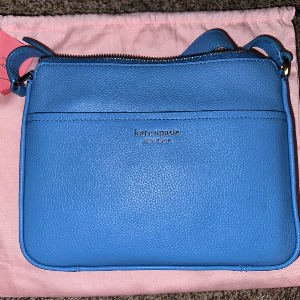 Brand new Kate spade bag (comes with dust bag) never used.
